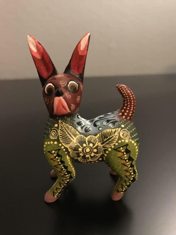 Mini chihuaha dog with brown face made of wood and delicately painted by hand by mexican artists