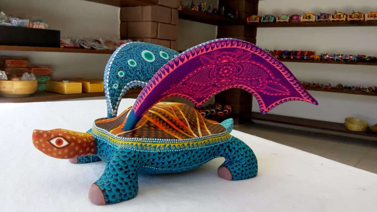 Very imaginative made under comission with the shape of a turtle with wings and a quokka riding on its back.